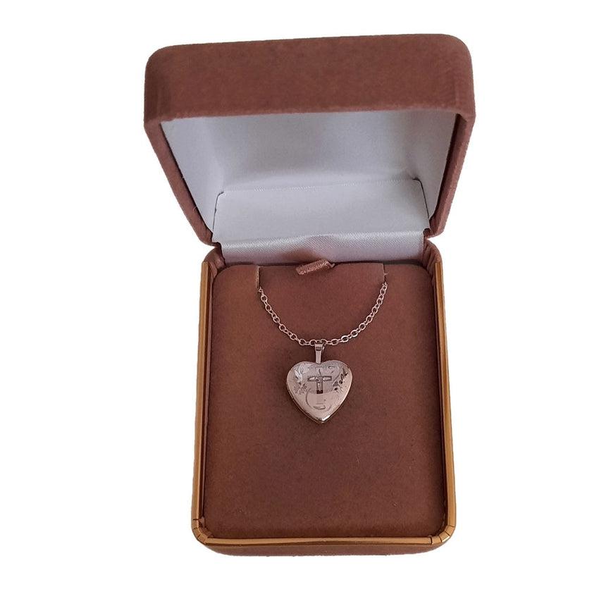 16mm Real Diamond Cross Set Into a Sterling Silver Locket