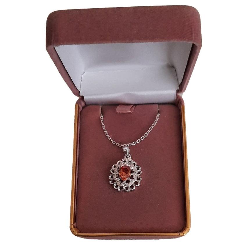 Amber Topaz Stone Pendant With a Silver And CZ Starburst Surround