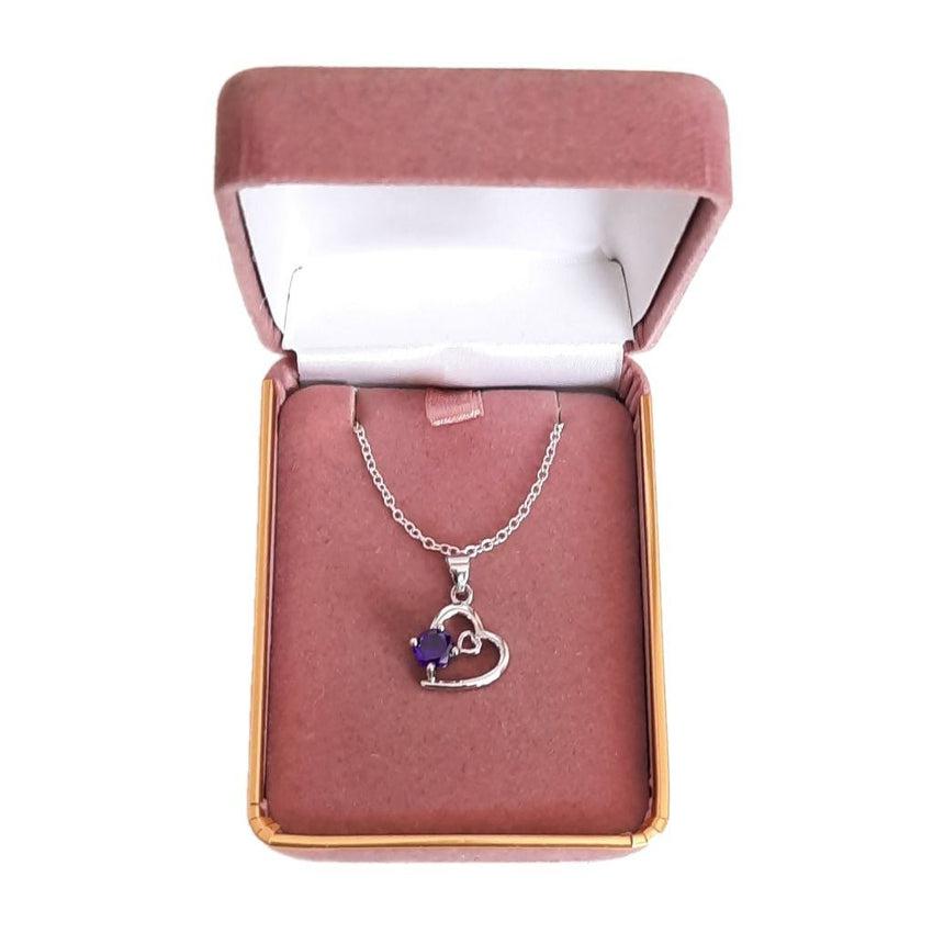 Open Silver Heart Pendant With A Purple Stone