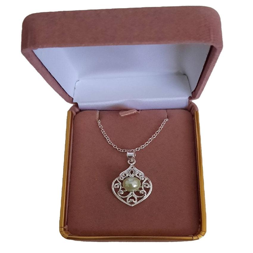 Silver Scroll Surround Light Green Pearl Pendant