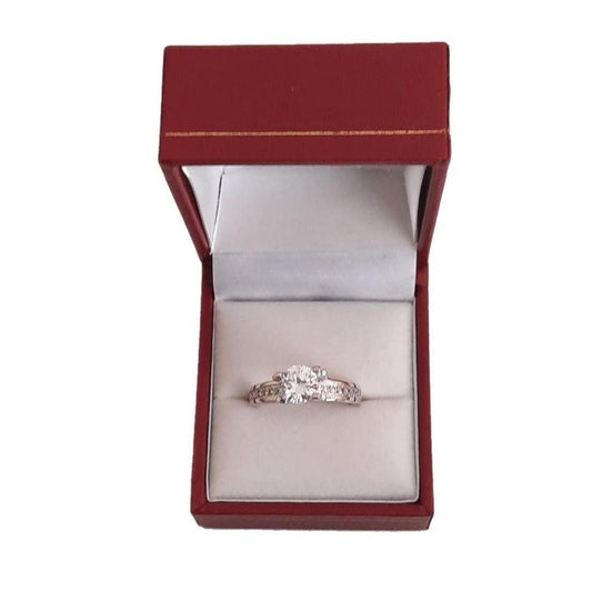 Sterling Silver Channel Set Cubic Zirconia Band With a Single White Stone Finish
