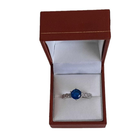Three Blue Stones With Inlaid Cubic Zirconia Setting Ladies Ring