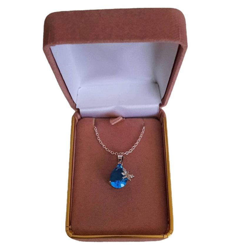 Turquoise Pear Drop Stone With a Silver Butterfly Pendant