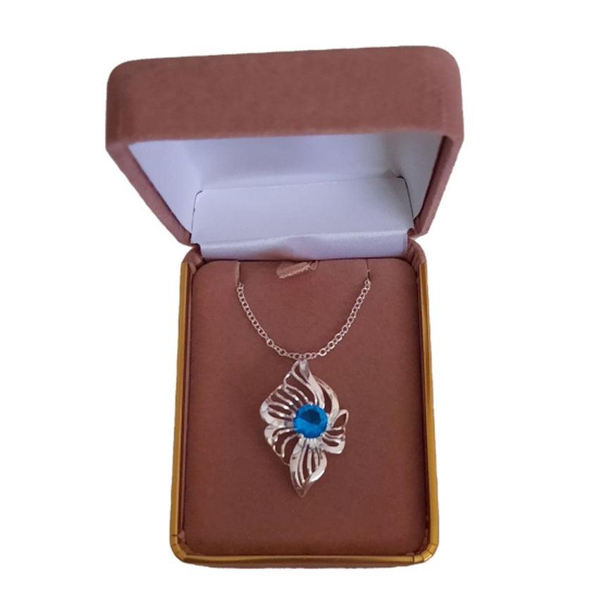 Unusual Wavy Design Silver Pendant With A Light Blue Centre Stone