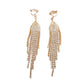 Dangly Diamante And Gold Clip On Earrings