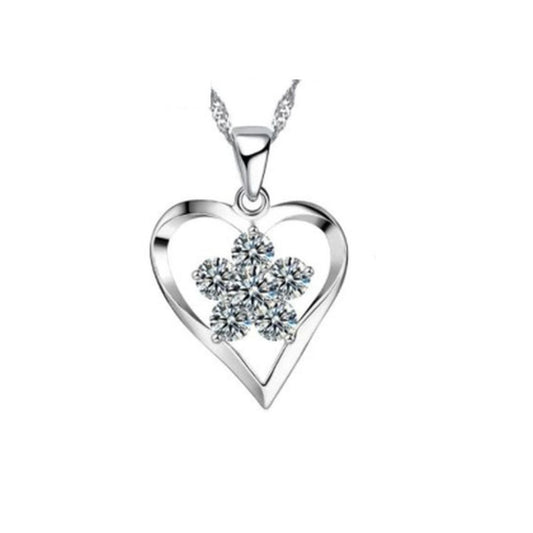 Open Silver Heart Pendant With a Cubic Zirconia Flower Centre Stone