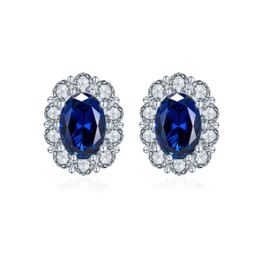 Sterling Silver Blue Centre Flower Earrings with a CZ Surround