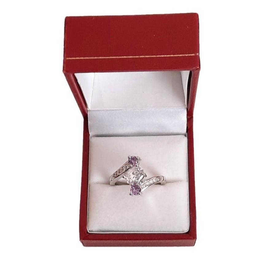 2 Purple Stone Twist Ring With A White Cubic Zirconia Centre