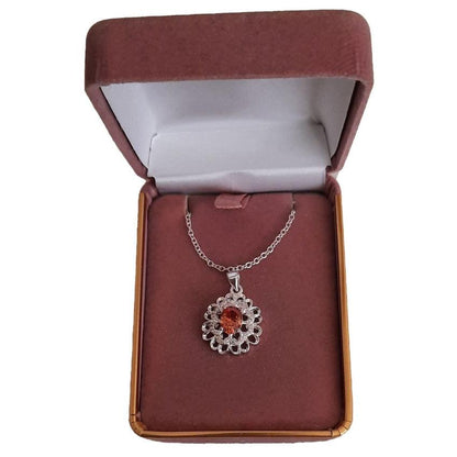 Amber Topaz Stone Pendant With a Silver And CZ Starburst Surround