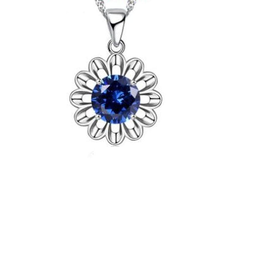 Blue Solitaire Centre Flower Pendant With Open Silver Surround