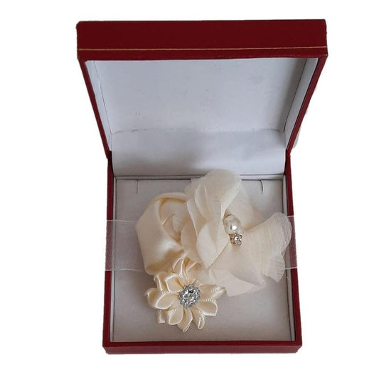 Cream Satin Rosebud With A Pearl Centre Flower Wrist Corsage