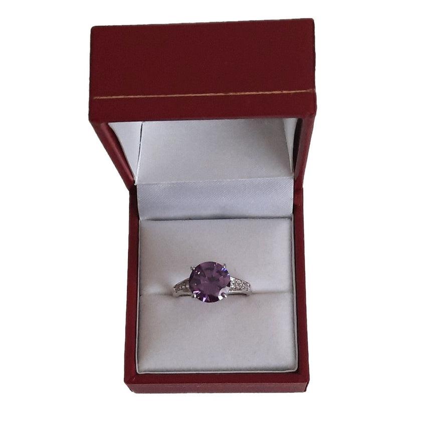 Deep Set Cubic Zirconia Band Ring With a Round Purple Centre Stone