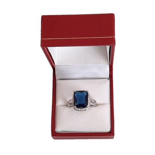 Rectangle Blue Centre Stone Ring With a CZ Surround and Baguette Set Shoulders