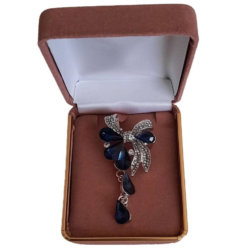 Silver Tone Brooch With A Blue Flower Drop