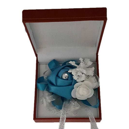 Teal Blue Satin Rosebud With a Diamante Centre Wrist Corsage