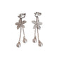 White Flower Dangly Clip On Earrings